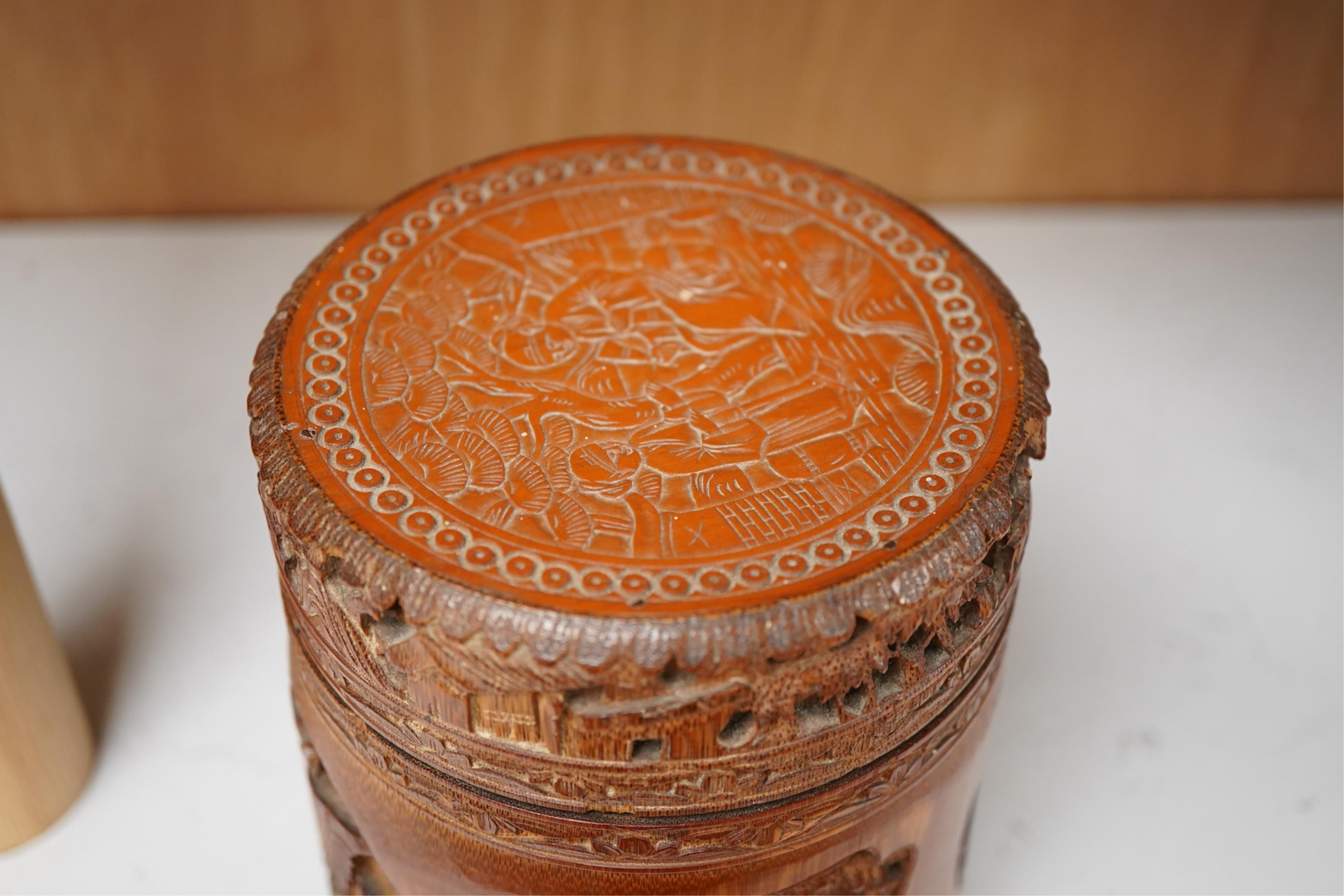 A Chinese carved bamboo tobacco jar and cover, 15cm high